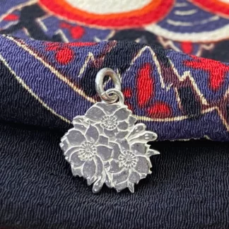 Pendentif pièce de monnaie 100 yen japonaise
