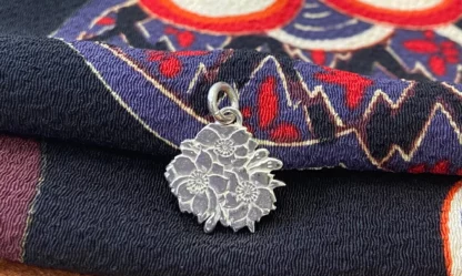 Pendentif pièce de monnaie 100 yen japonaise