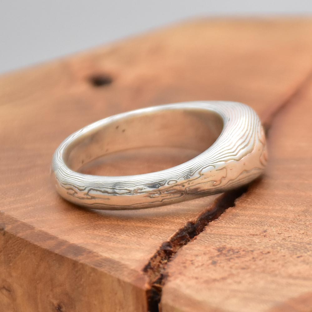 chevalière homme en mokume gane antoine puygrenier artisan bijoutier joaillier lyon pièce unique personnalisée