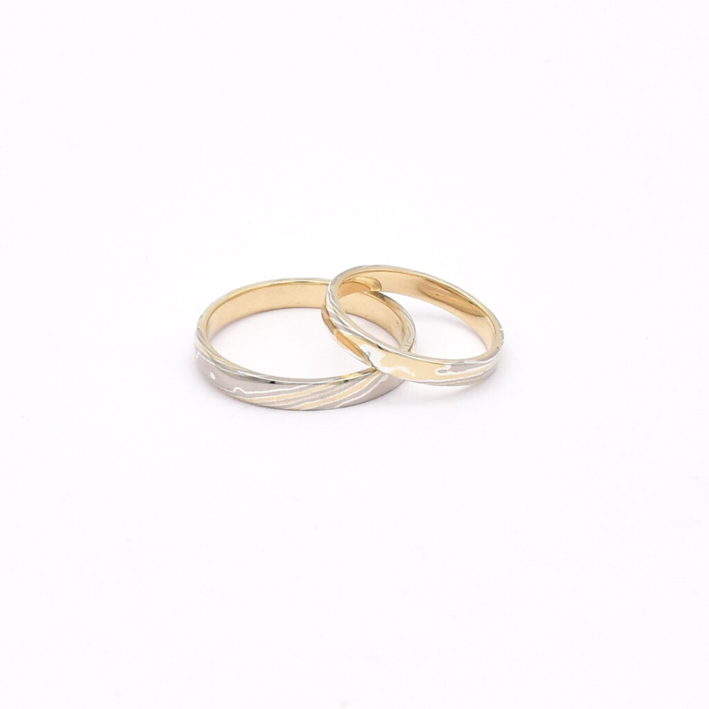 Antoine Puygrenier, artisan bijoutier joaillier Lyon. Alliance japonaise unique et personnalisée. Mokume-gane or jaune or gris palladié. mokuoumé gané effet bois.